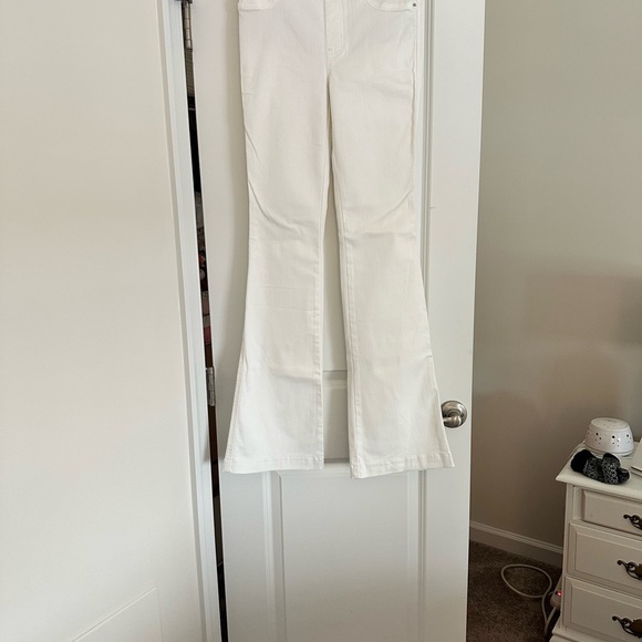 SPANX EveryWear Flare Jeans in White - Regular length. - Picture 2 of 5